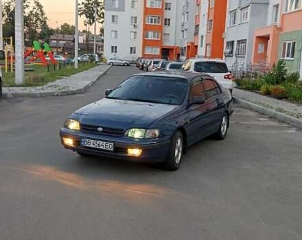 Синій Тойота Carina E, об'ємом двигуна 2 л та пробігом 397 тис. км за 4750 $, фото 2 на Automoto.ua