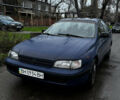 Синій Тойота Carina E, об'ємом двигуна 2 л та пробігом 188 тис. км за 1750 $, фото 1 на Automoto.ua