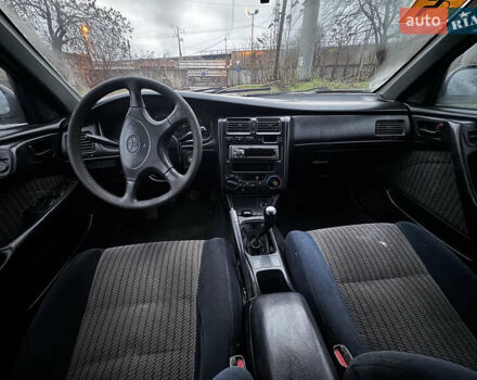 Синій Тойота Carina E, об'ємом двигуна 2 л та пробігом 188 тис. км за 1750 $, фото 8 на Automoto.ua