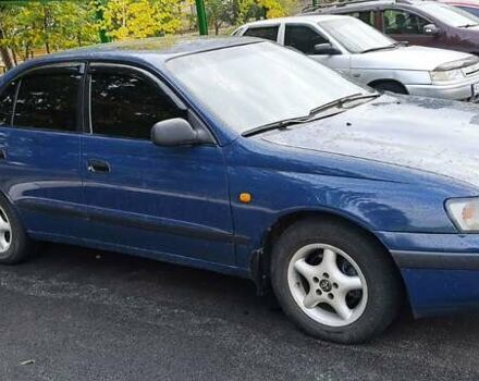 Синій Тойота Carina E, об'ємом двигуна 2 л та пробігом 397 тис. км за 4750 $, фото 4 на Automoto.ua