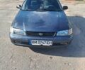 Синий Тойота Carina E, объемом двигателя 2 л и пробегом 307 тыс. км за 3500 $, фото 1 на Automoto.ua