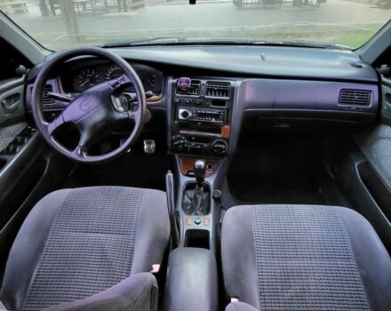 Синій Тойота Carina E, об'ємом двигуна 1.8 л та пробігом 290 тис. км за 1650 $, фото 10 на Automoto.ua