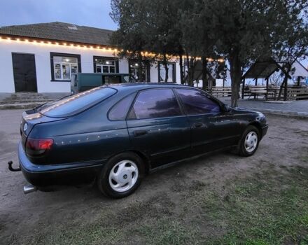 Синій Тойота Carina E, об'ємом двигуна 1.8 л та пробігом 290 тис. км за 1650 $, фото 4 на Automoto.ua