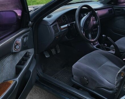 Синій Тойота Carina E, об'ємом двигуна 1.8 л та пробігом 290 тис. км за 1650 $, фото 9 на Automoto.ua