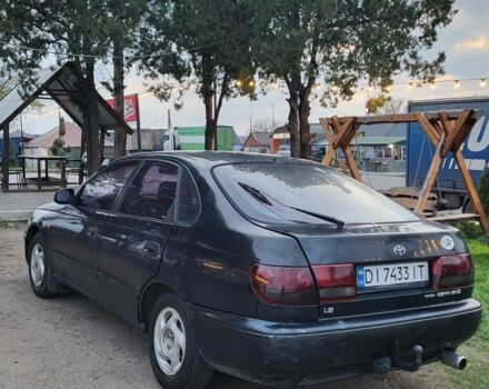 Синій Тойота Carina E, об'ємом двигуна 1.8 л та пробігом 290 тис. км за 1650 $, фото 5 на Automoto.ua