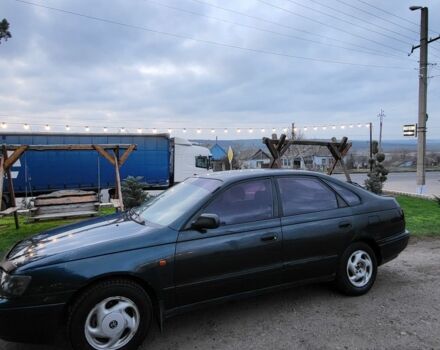 Синій Тойота Carina E, об'ємом двигуна 1.8 л та пробігом 290 тис. км за 1650 $, фото 3 на Automoto.ua