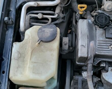 Синій Тойота Carina E, об'ємом двигуна 1.8 л та пробігом 290 тис. км за 1650 $, фото 11 на Automoto.ua