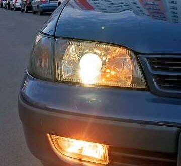 Синій Тойота Carina E, об'ємом двигуна 2 л та пробігом 397 тис. км за 4750 $, фото 1 на Automoto.ua