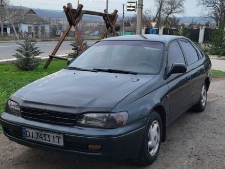 Синий Тойота Carina E, объемом двигателя 1.8 л и пробегом 290 тыс. км за 1650 $, фото 1 на Automoto.ua