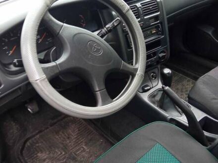 Синій Тойота Carina E, об'ємом двигуна 2 л та пробігом 460 тис. км за 1000 $, фото 1 на Automoto.ua