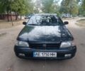 Зеленый Тойота Carina E, объемом двигателя 1.6 л и пробегом 450 тыс. км за 2000 $, фото 1 на Automoto.ua