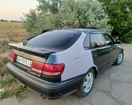 Зеленый Тойота Carina E, объемом двигателя 2 л и пробегом 300 тыс. км за 2699 $, фото 3 на Automoto.ua