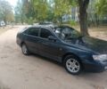 Зеленый Тойота Carina E, объемом двигателя 1.6 л и пробегом 450 тыс. км за 2000 $, фото 2 на Automoto.ua