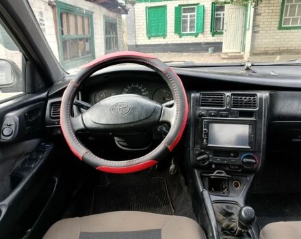 Зеленый Тойота Carina E, объемом двигателя 1.6 л и пробегом 200 тыс. км за 2100 $, фото 6 на Automoto.ua