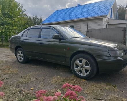 Зеленый Тойота Carina E, объемом двигателя 1.6 л и пробегом 200 тыс. км за 2100 $, фото 2 на Automoto.ua