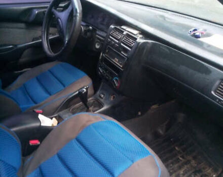 Зеленый Тойота Carina E, объемом двигателя 1.6 л и пробегом 180 тыс. км за 2099 $, фото 6 на Automoto.ua