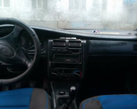 Зеленый Тойота Carina E, объемом двигателя 1.6 л и пробегом 180 тыс. км за 2099 $, фото 5 на Automoto.ua