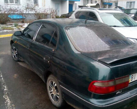 Зеленый Тойота Carina E, объемом двигателя 1.6 л и пробегом 180 тыс. км за 2099 $, фото 1 на Automoto.ua