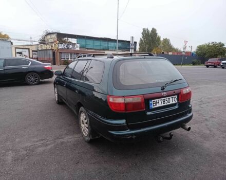 Зелений Тойота Carina E, об'ємом двигуна 1.6 л та пробігом 290 тис. км за 2300 $, фото 4 на Automoto.ua