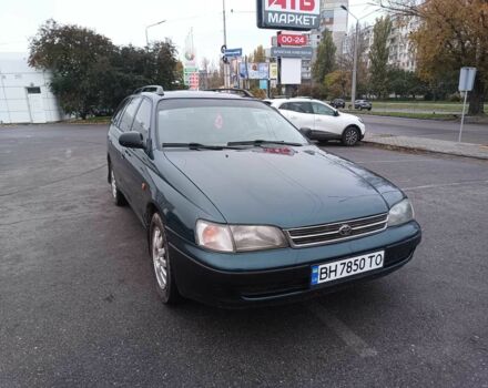 Зелений Тойота Carina E, об'ємом двигуна 1.6 л та пробігом 290 тис. км за 2300 $, фото 1 на Automoto.ua