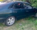Зеленый Тойота Carina E, объемом двигателя 2 л и пробегом 300 тыс. км за 2200 $, фото 1 на Automoto.ua