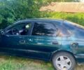 Зеленый Тойота Carina E, объемом двигателя 2 л и пробегом 300 тыс. км за 2200 $, фото 1 на Automoto.ua