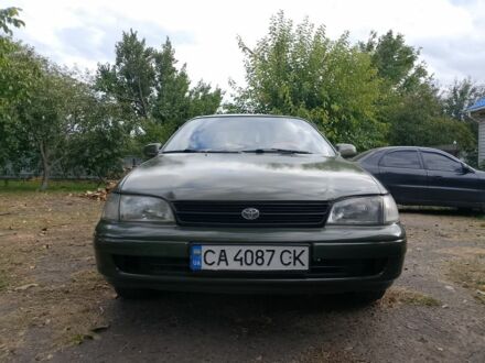 Зеленый Тойота Carina E, объемом двигателя 1.6 л и пробегом 200 тыс. км за 2100 $, фото 1 на Automoto.ua