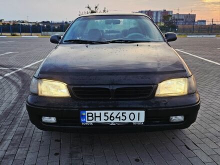 Зеленый Тойота Carina E, объемом двигателя 1.6 л и пробегом 333 тыс. км за 1750 $, фото 1 на Automoto.ua