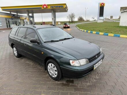 Зелений Тойота Carina E, об'ємом двигуна 1.6 л та пробігом 368 тис. км за 2499 $, фото 1 на Automoto.ua