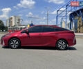 Червоний Тойота Prius Prime, об'ємом двигуна 1.8 л та пробігом 118 тис. км за 17000 $, фото 1 на Automoto.ua