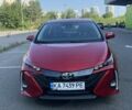 Красный Тойота Prius Prime, объемом двигателя 1.8 л и пробегом 136 тыс. км за 17800 $, фото 1 на Automoto.ua