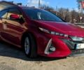 Красный Тойота Prius Prime, объемом двигателя 1.8 л и пробегом 130 тыс. км за 18666 $, фото 1 на Automoto.ua