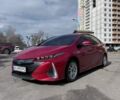 Красный Тойота Prius Prime, объемом двигателя 1.8 л и пробегом 103 тыс. км за 23000 $, фото 1 на Automoto.ua