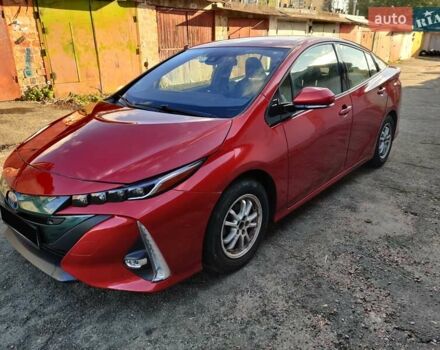 Червоний Тойота Prius Prime, об'ємом двигуна 1.8 л та пробігом 93 тис. км за 18500 $, фото 1 на Automoto.ua