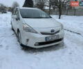 Белый Тойота Prius v, объемом двигателя 1.8 л и пробегом 150 тыс. км за 13800 $, фото 1 на Automoto.ua