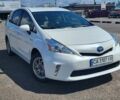 Белый Тойота Prius v, объемом двигателя 1.8 л и пробегом 230 тыс. км за 13500 $, фото 1 на Automoto.ua