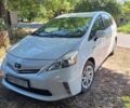 Білий Тойота Prius v, об'ємом двигуна 1.8 л та пробігом 218 тис. км за 12500 $, фото 1 на Automoto.ua