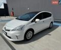 Білий Тойота Prius v, об'ємом двигуна 1.8 л та пробігом 298 тис. км за 10200 $, фото 1 на Automoto.ua