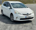 Белый Тойота Prius v, объемом двигателя 1.8 л и пробегом 340 тыс. км за 13200 $, фото 1 на Automoto.ua