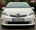 Белый Тойота Prius v, объемом двигателя 1.8 л и пробегом 198 тыс. км за 13800 $, фото 1 на Automoto.ua