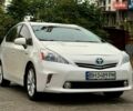 Белый Тойота Prius v, объемом двигателя 1.8 л и пробегом 198 тыс. км за 13800 $, фото 1 на Automoto.ua