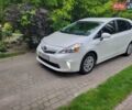 Белый Тойота Prius v, объемом двигателя 1.8 л и пробегом 197 тыс. км за 14000 $, фото 1 на Automoto.ua