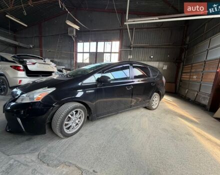 Чорний Тойота Prius v, об'ємом двигуна 1.8 л та пробігом 210 тис. км за 9600 $, фото 1 на Automoto.ua