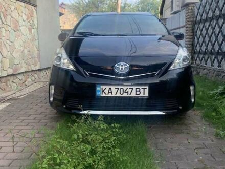 Чорний Тойота Prius v, об'ємом двигуна 1.8 л та пробігом 230 тис. км за 12000 $, фото 1 на Automoto.ua