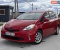 Красный Тойота Prius v, объемом двигателя 1.8 л и пробегом 281 тыс. км за 9700 $, фото 1 на Automoto.ua