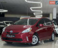 Красный Тойота Prius v, объемом двигателя 1.8 л и пробегом 235 тыс. км за 12699 $, фото 1 на Automoto.ua