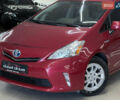 Красный Тойота Prius v, объемом двигателя 1.8 л и пробегом 235 тыс. км за 11789 $, фото 1 на Automoto.ua