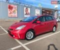 Красный Тойота Prius v, объемом двигателя 1.8 л и пробегом 206 тыс. км за 12400 $, фото 1 на Automoto.ua