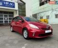 Красный Тойота Prius v, объемом двигателя 1.8 л и пробегом 342 тыс. км за 8499 $, фото 1 на Automoto.ua