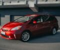 Красный Тойота Prius v, объемом двигателя 1.8 л и пробегом 196 тыс. км за 12500 $, фото 1 на Automoto.ua